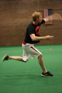 Junior Thaddeus Golbek lets a dodgeball fly Monday night. “It’s a good way to release tension after a frustrating day and it is a safe place to get your aggression out,” said Golbeck. Photo By Cameron Holcomb